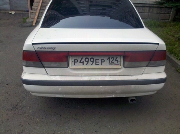 Установка лип-спойлера Nissan Sunny b15