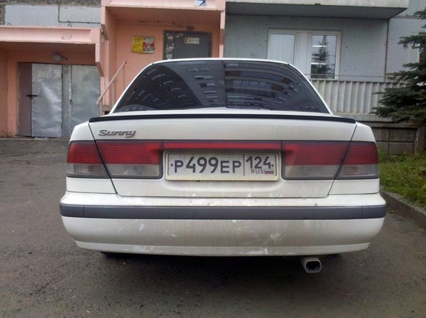 Установка лип-спойлера Nissan Sunny b15