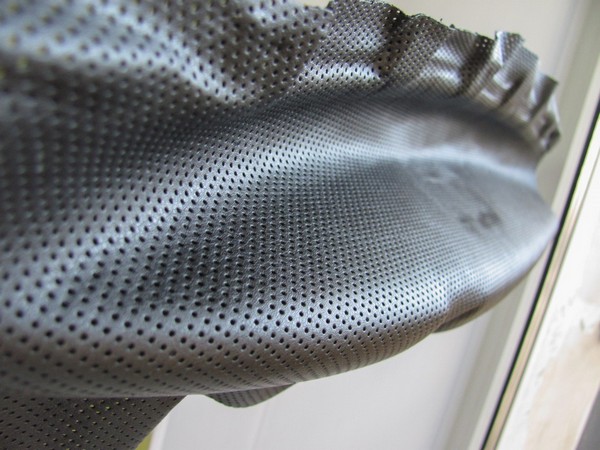 Обтяжка подлокотников Nissan Qashqai кожей