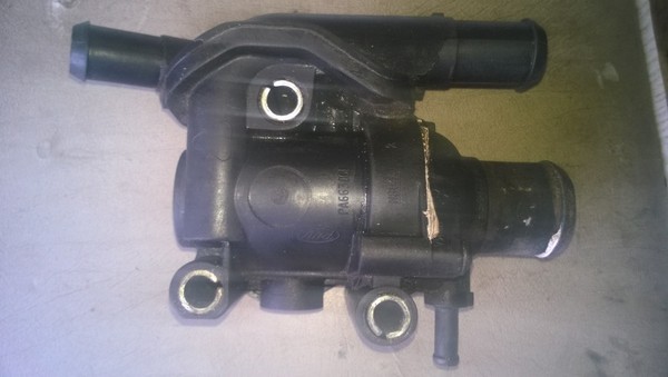 Замена корпуса термостата в Ford Focus 1